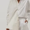 DONNI. Tops>Duo Pop Button Down Powder/Creme